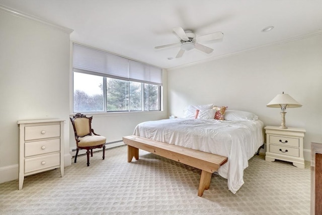 bedroom with a baseboard heating unit, light colored carpet, and crown molding