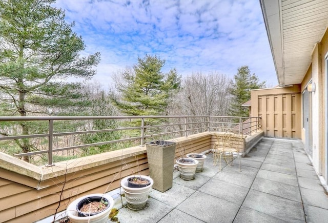 view of patio with a balcony