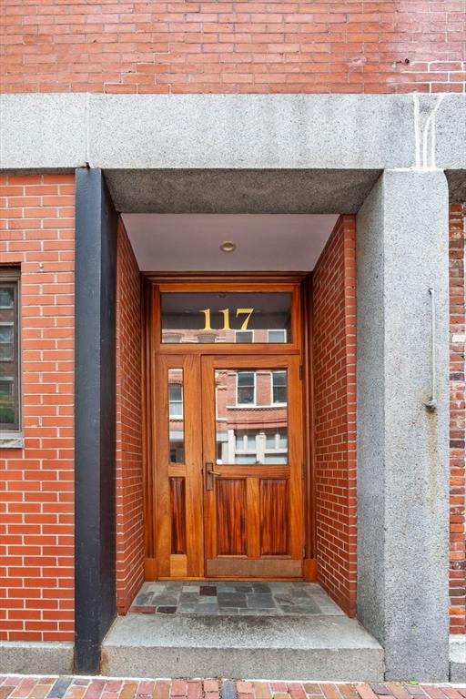 117 Fulton St Unit 4, Boston, MA 02109 - entrance to property with brick siding