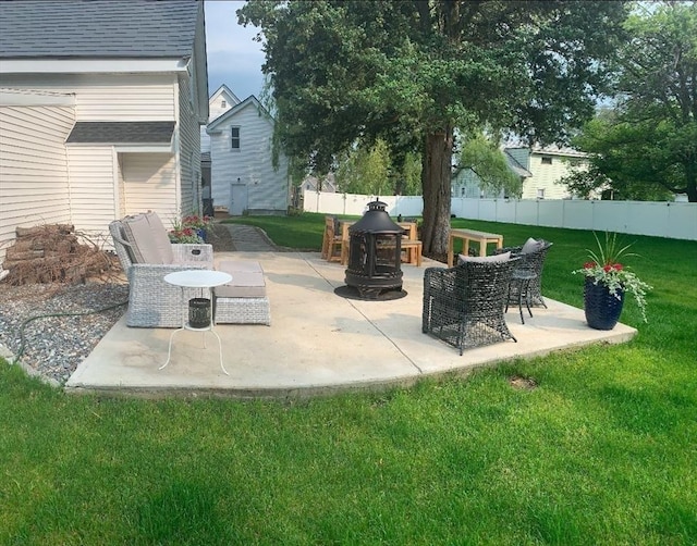 view of patio / terrace with a fire pit