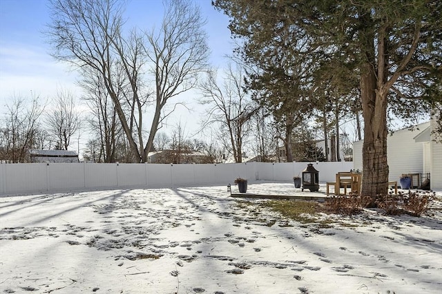 view of snowy yard