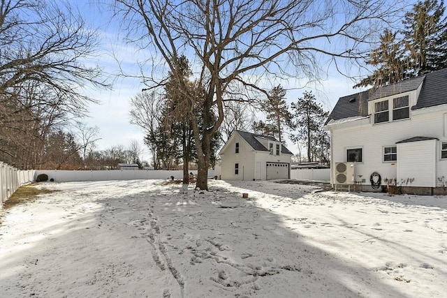 view of yard layered in snow