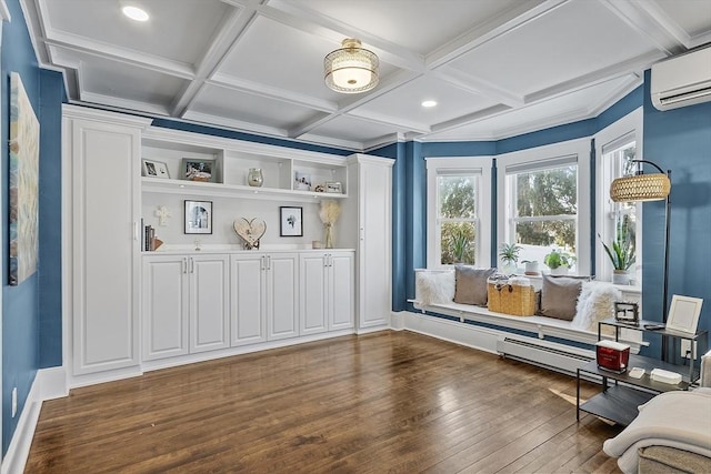 sitting room featuring beam ceiling, dark wood-type flooring, coffered ceiling, and a wall unit AC