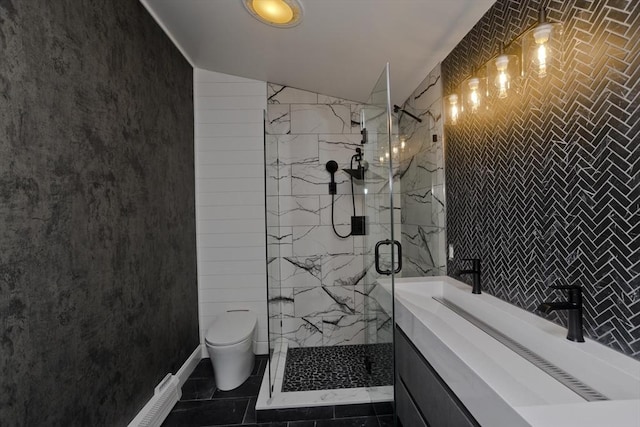 16 Poole Rd, Belchertown, MA 01007 - bathroom featuring toilet, lofted ceiling, tile walls, tile patterned floors, and a marble finish shower