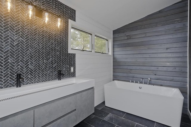 16 Poole Rd, Belchertown, MA 01007 - full bath featuring wood walls, vaulted ceiling, and a soaking tub