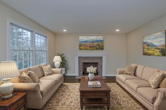 16 Poole Rd, Belchertown, MA 01007 - living room featuring a brick fireplace, recessed lighting, wood finished floors, and baseboards
