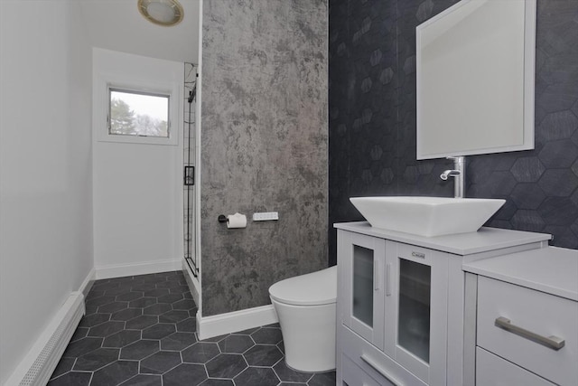 16 Poole Rd, Belchertown, MA 01007 - bathroom with vanity, baseboards, tile patterned flooring, toilet, and a shower stall
