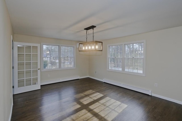 16 Poole Rd, Belchertown, MA 01007 - unfurnished dining area with a baseboard heating unit, dark wood finished floors, and a wealth of natural light
