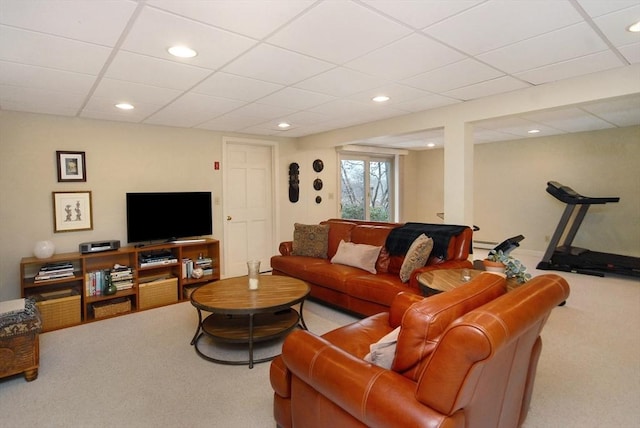 living room featuring recessed lighting, carpet flooring, and a drop ceiling