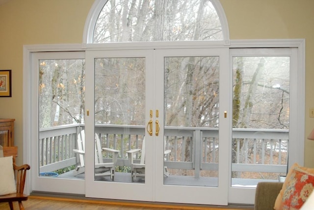 doorway to outside featuring wood finished floors