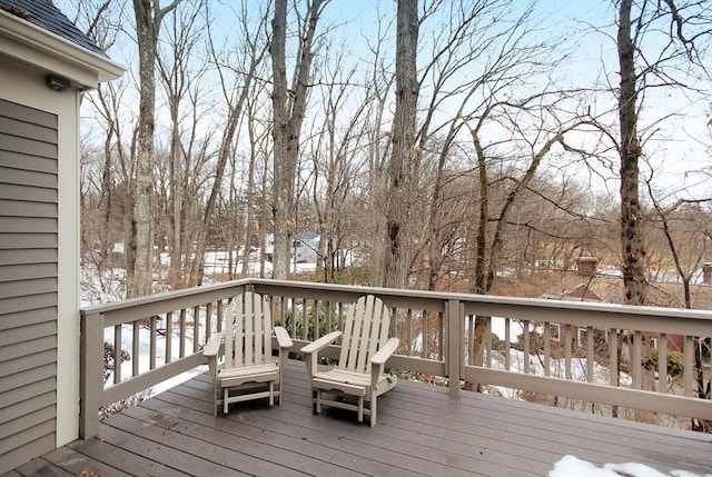 view of snow covered deck