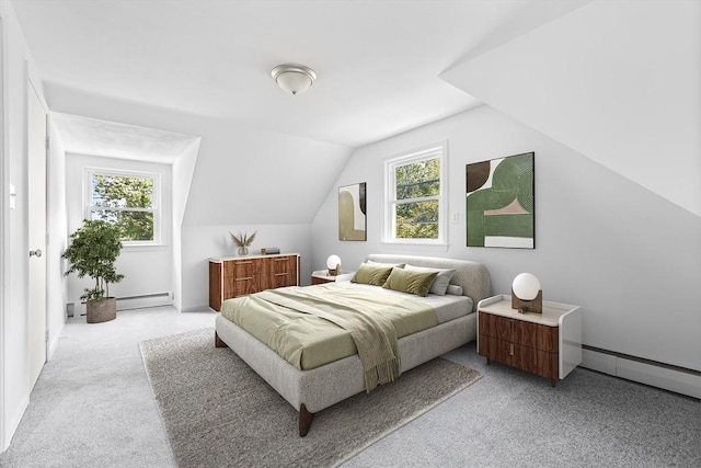 9 Margaret St, Burlington, MA 01803 - bedroom with light carpet, vaulted ceiling, a baseboard heating unit, and baseboard heating