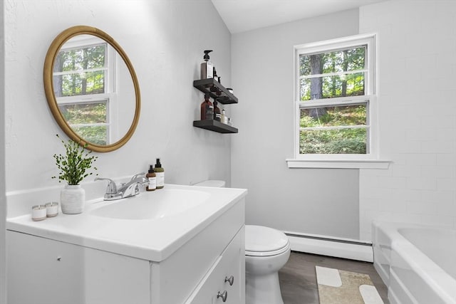 9 Margaret St, Burlington, MA 01803 - full bath with a baseboard radiator, vanity, a bath, and a shower