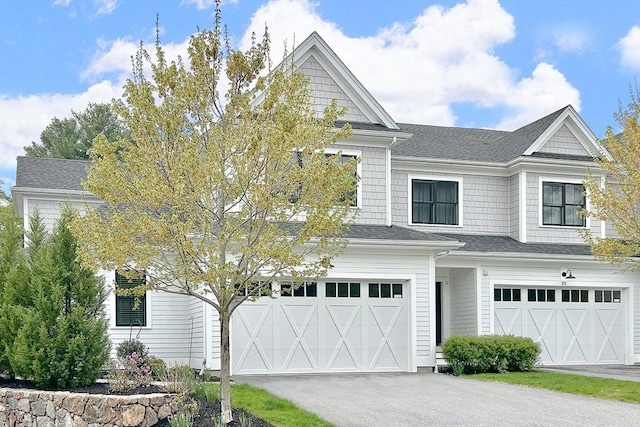 30 Southfield Ln Unit 30, Sherborn, MA 01770 - view of front of property featuring a garage, asphalt driveway, and a shingled roof