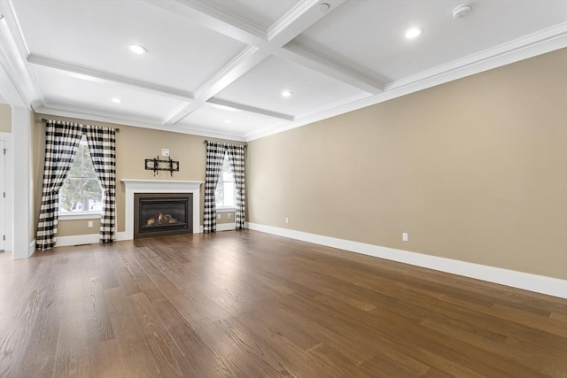 30 Southfield Ln Unit 30, Sherborn, MA 01770 - unfurnished living room with healthy amount of natural light, coffered ceiling, wood finished floors, beam ceiling, and baseboards