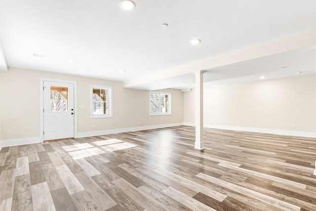 30 Southfield Ln Unit 30, Sherborn, MA 01770 - below grade area with light wood finished floors, baseboards, and recessed lighting
