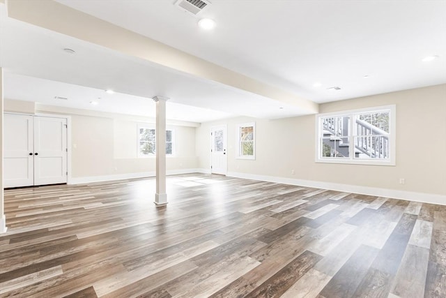 30 Southfield Ln Unit 30, Sherborn, MA 01770 - below grade area with light wood-style floors, healthy amount of natural light, baseboards, and recessed lighting