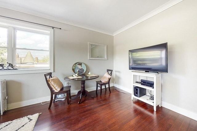 1834 Beacon St Unit 16, Brookline, MA 02445 - dining area featuring crown molding, hardwood / wood-style floors, baseboards, and radiator