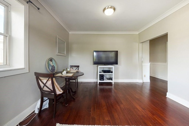 1834 Beacon St Unit 16, Brookline, MA 02445 - dining area featuring crown molding, wood finished floors, and baseboards