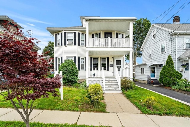 26 Enfield Rd, Winthrop, MA 02152 - townhome / multi-family property featuring a balcony and a porch