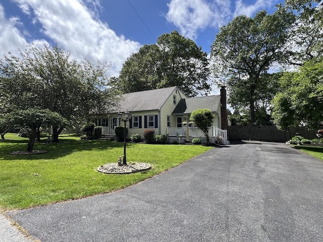 6 Jeffrey Ln, Freetown, MA 02702 - view of front facade featuring a chimney and asphalt driveway