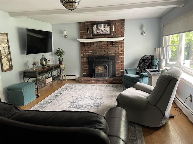 6 Jeffrey Ln, Freetown, MA 02702 - living area with beamed ceiling, wood finished floors, a baseboard radiator, and a baseboard heating unit