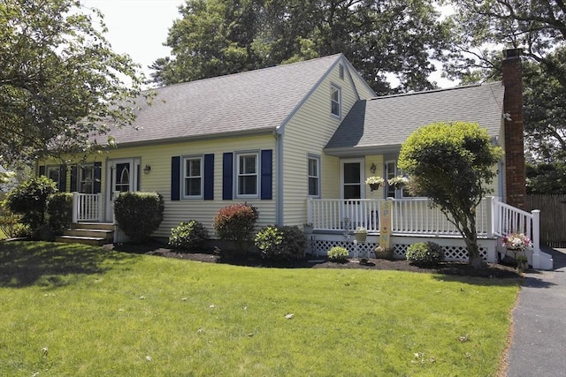 6 Jeffrey Ln, Freetown, MA 02702 - view of front of property featuring covered porch, a front lawn, roof with shingles, and a chimney