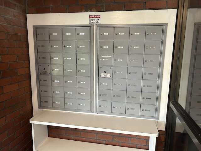view of home's community with mail area