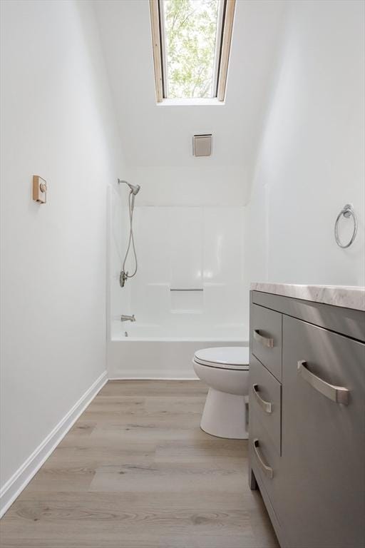 22 Frenier Ave Unit 9, Attleboro, MA 02703 - full bathroom with toilet, wood finished floors, and vanity