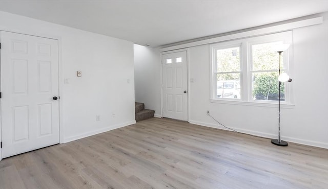 22 Frenier Ave Unit 9, Attleboro, MA 02703 - foyer entrance with wood finished floors, stairs, and healthy amount of natural light