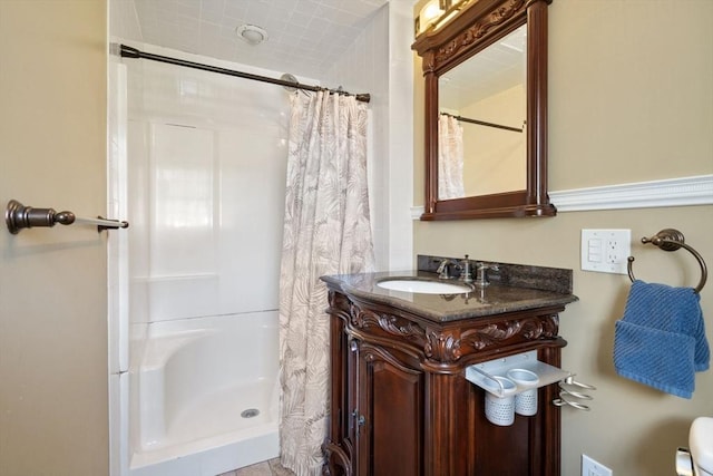 bathroom with vanity and curtained shower