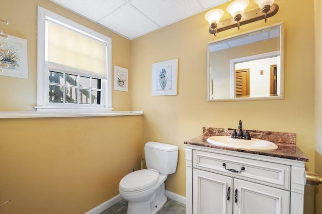 bathroom with vanity, tile patterned floors, and toilet