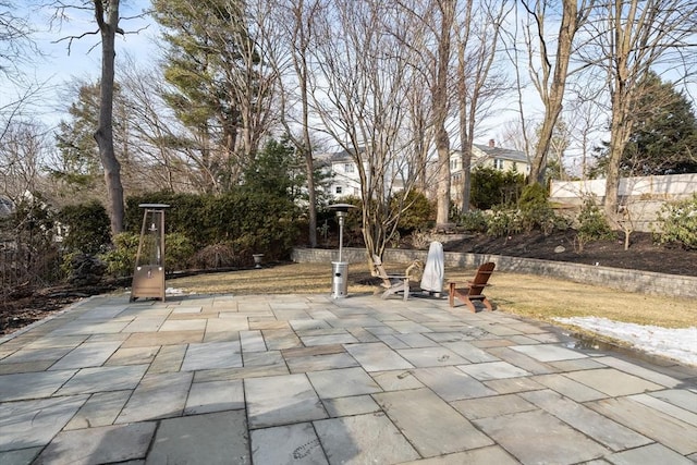 view of patio / terrace featuring fence