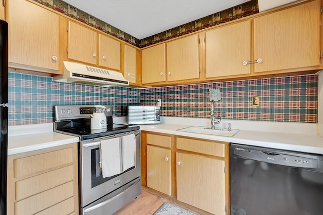 42 Nassau Dr Unit 42, Springfield, MA 01129 - kitchen with dishwashing machine, exhaust hood, stainless steel range with electric stovetop, a sink, and light countertops