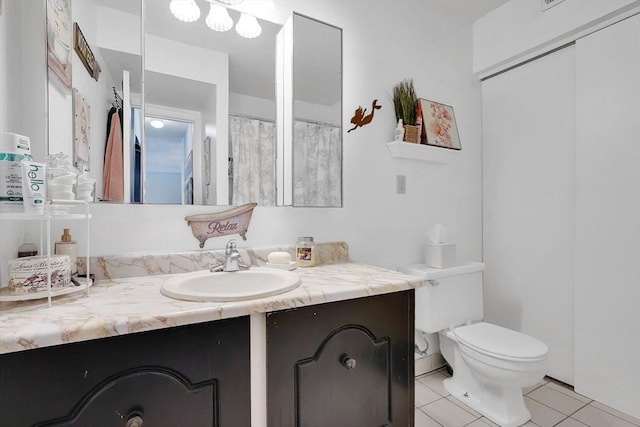 42 Nassau Dr Unit 42, Springfield, MA 01129 - bathroom with tile patterned floors, vanity, and toilet