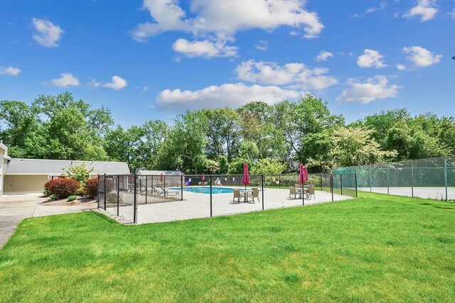 42 Nassau Dr Unit 42, Springfield, MA 01129 - view of playground with view of scattered trees and a community pool