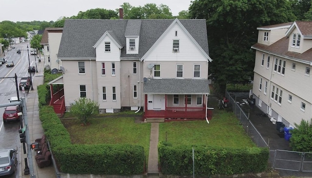 2 Stanton St, Boston, MA 02124 - view of front of property featuring roof with shingles and a chimney