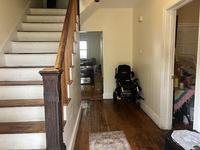 2 Stanton St, Boston, MA 02124 - stairs with wood-type flooring and baseboards