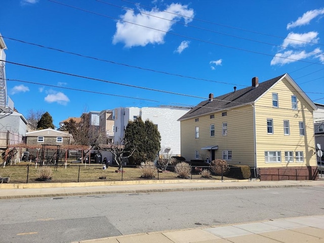 view of home's exterior featuring a fenced front yard