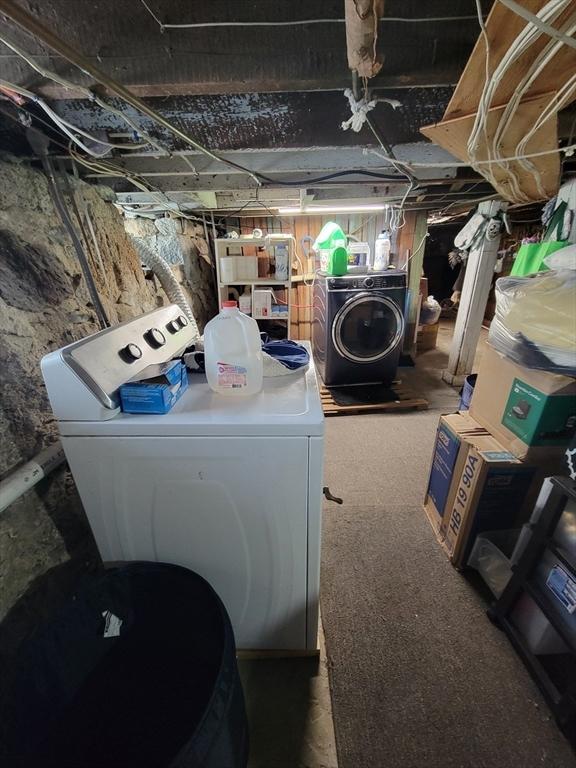 unfinished basement with separate washer and dryer