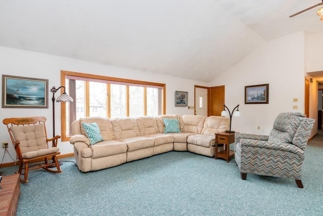 carpeted living area featuring a ceiling fan and lofted ceiling