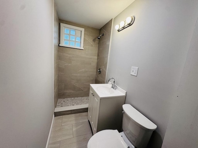 14 Gage St, Worcester, MA 01605 - bathroom with a tile shower, vanity, and tile patterned flooring