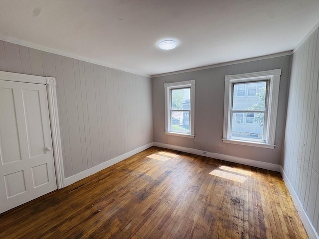 14 Gage St, Worcester, MA 01605 - unfurnished room featuring hardwood / wood-style floors, ornamental molding, and wood walls