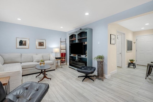 585 Sheridan St Unit 8, Chicopee, MA 01020 - living room with light wood finished floors, baseboards, and recessed lighting