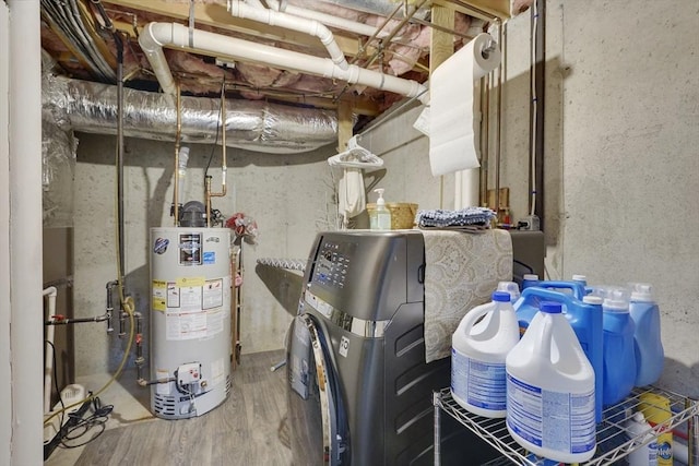585 Sheridan St Unit 8, Chicopee, MA 01020 - interior space featuring water heater, washer / clothes dryer, and wood finished floors