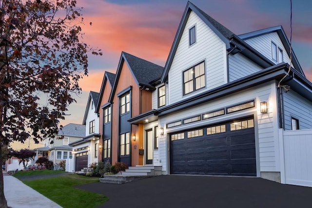 view of front of property featuring a garage