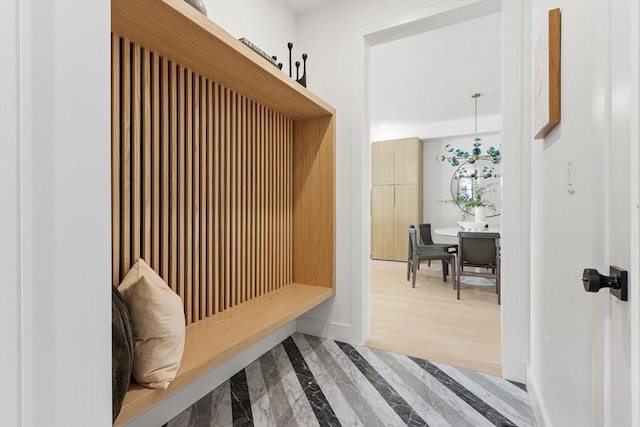 mudroom with hardwood / wood-style floors