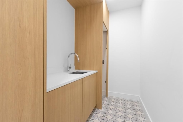 laundry room featuring sink