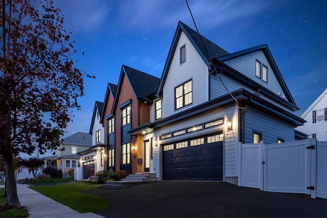 view of front of property with a garage