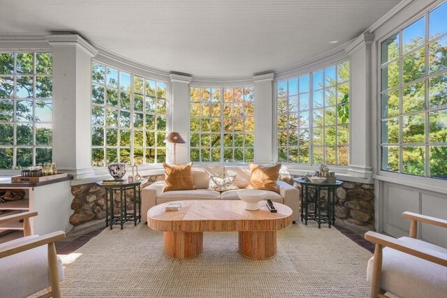 sunroom featuring crown molding